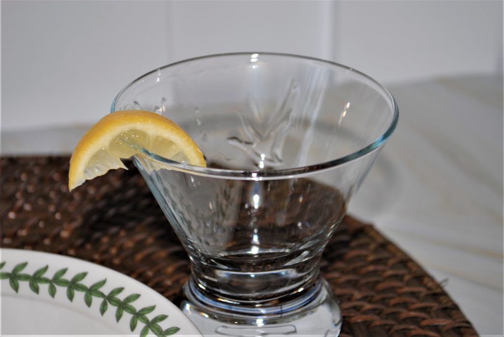 Rim the Martini glass with lemon